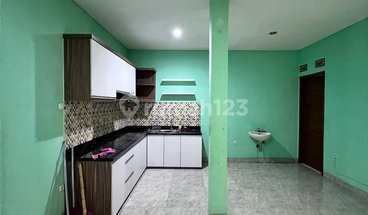 rumah modern minimalis di perumahan cempaka hijau 2