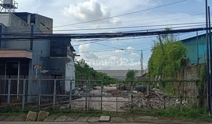Tanah kosong bagus bonus rumah di jalan raya Kota Tangerang jual murah 2