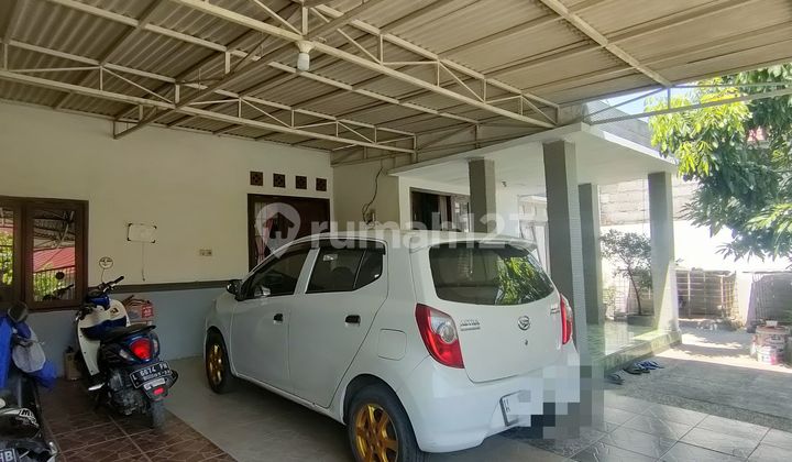 Ready-to-occupy spacious 1-story house, good West-facing SHM, in Kotabaru Driyorejo Housing, Gresik, East Java. 2