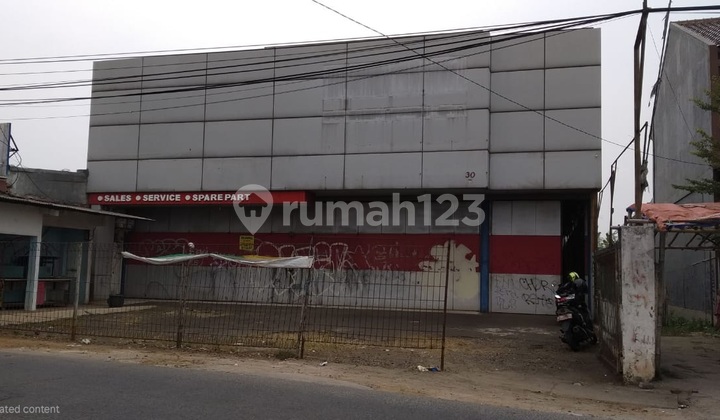 For Sale Ex-Dealer and Large Land by Main Road in Depok, West Java For Sale Ex-Dealer and Large Land by Main Road in Depok, West Java