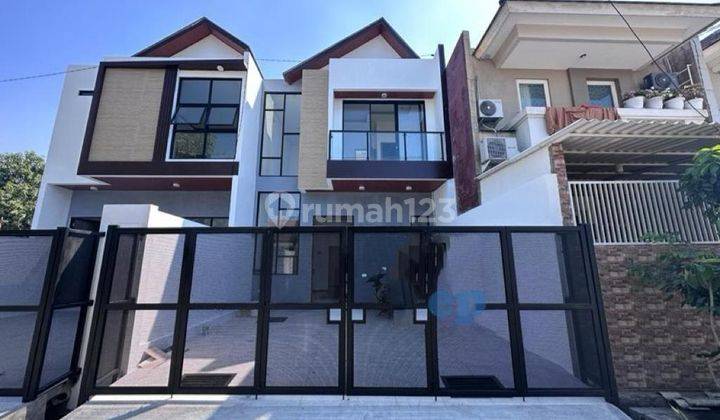 Rumah Minimalis 2 Lantai Baru SHM di Manyar Jaya Siap Huni  1