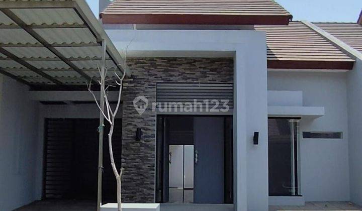 Rumah 1,5 Lantai Raffles Garden 1