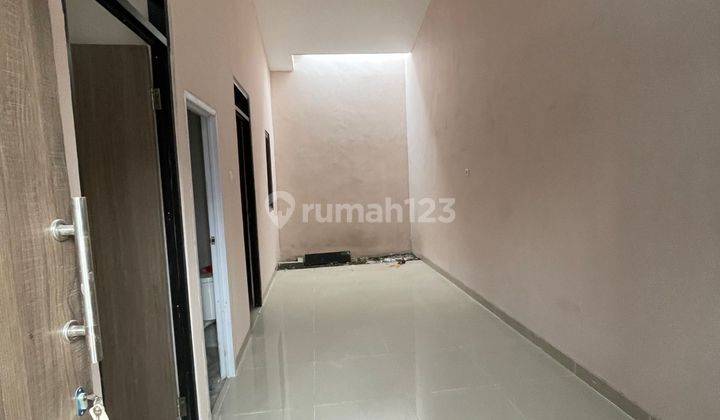 Dijual over kredit rumah murah strategis di sepatan strategis pinggir jalan raya 2