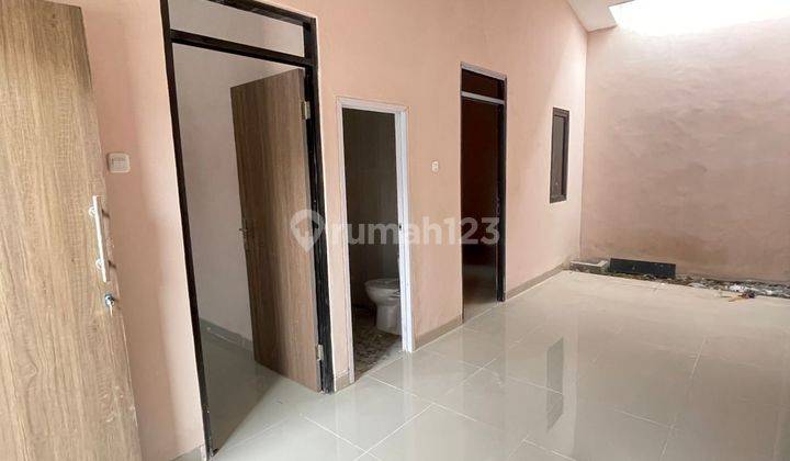 Dijual over kredit rumah murah strategis di sepatan strategis pinggir jalan raya 3
