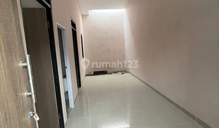 Dijual over kredit rumah murah strategis di sepatan strategis pinggir jalan raya 4