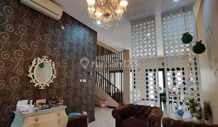 Rumah cantik fully furnished Di Cluster Asia Tropis Kota Harapan Indah Bekasi 1