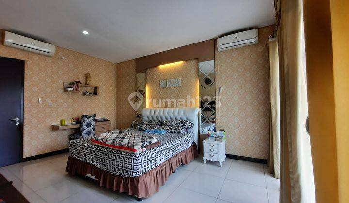 Rumah cantik fully furnished Di Cluster Asia Tropis Kota Harapan Indah Bekasi 2