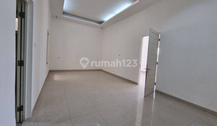 Rumah unfurnished di Janur Hijau sudah tinggibdari jalan l9kasi strategis 2