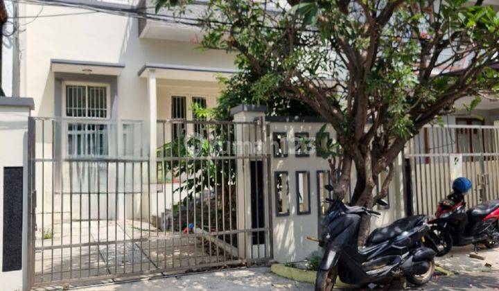 Rumah unfurnished di Janur Hijau sudah tinggibdari jalan l9kasi strategis 1