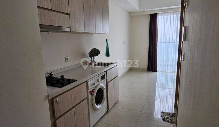 Apartemen semi furnished Sedayu City Suites type studio 2