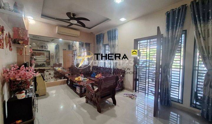 ruang tamu rumah semi furnished hadap timur