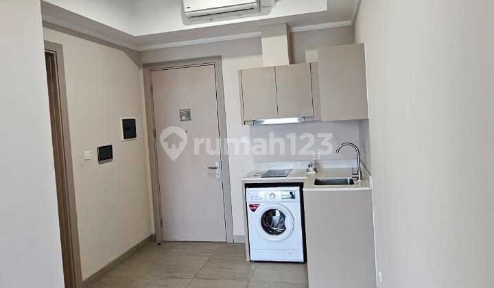 For rent 2 bedroom semi furnished Menara Jakarta Kemayoran