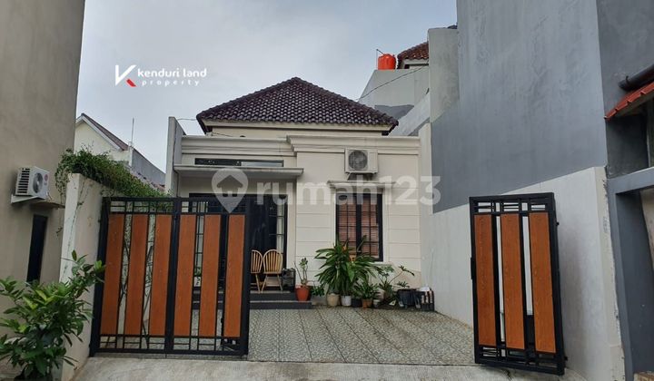 Modern 1.5-story residence with spacious land located in South Jakarta.