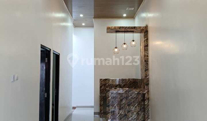 Rumah Siap Huni di Pesona Anggrek, Lingkungan Nyaman & Praktis (73619 Ds) 2