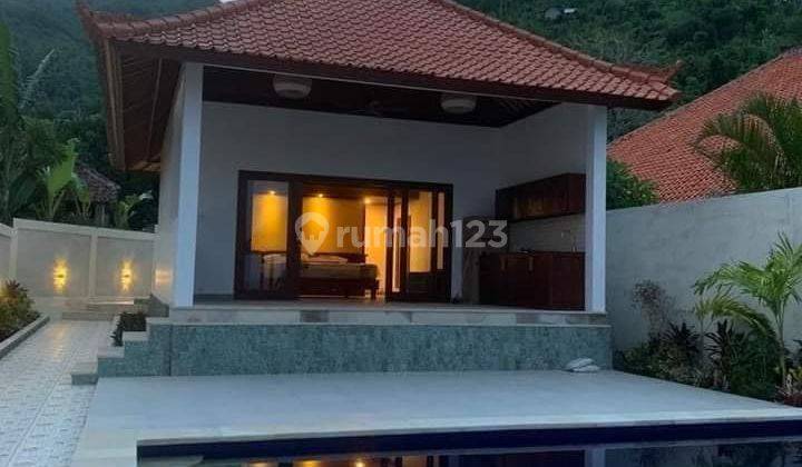 Beach front  in amed,beautiful  view,2 villa in the land 4