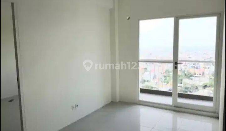 Apartemen PUNCAK DARMAHUSADA 2BR Plus 56m² Kosongan dkt Educity 2