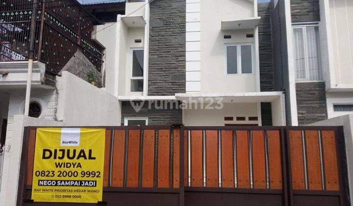 Rumah baru 2 lt minimalis di tengah kota 1