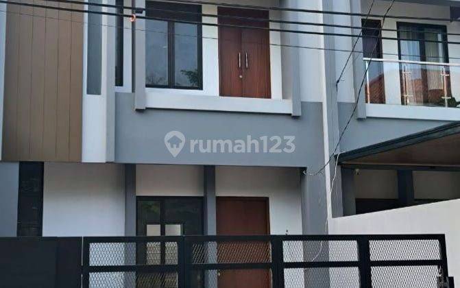 Rumah Minimalis Dalam Cluster Di Megapolitan Cinere Estate. 1