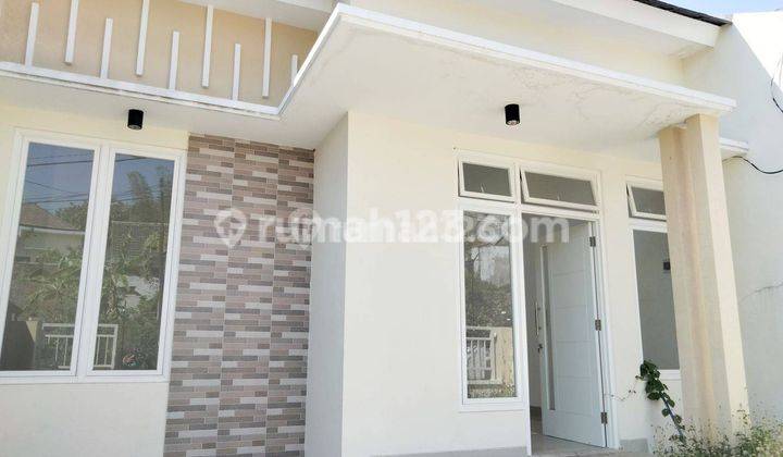 Rumah baru bagus dan modern lokasi nyaman asri dan aman di boulevard jalan kembar perumahan mutiara bandulan kota Malang 2