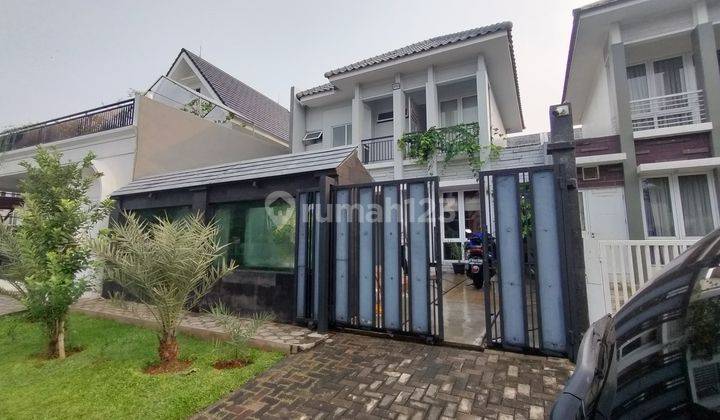 rumah estetik boulevard utama dengan pagar Aquarium  1