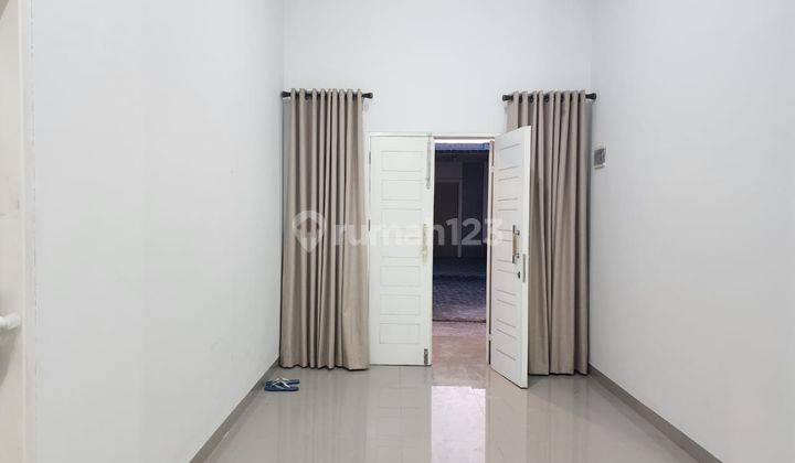 Disewakan rumah semi cluster , semi Furnished lokasi Jl. Karya Abadi / Riau Ujung - Pekanbaru 2