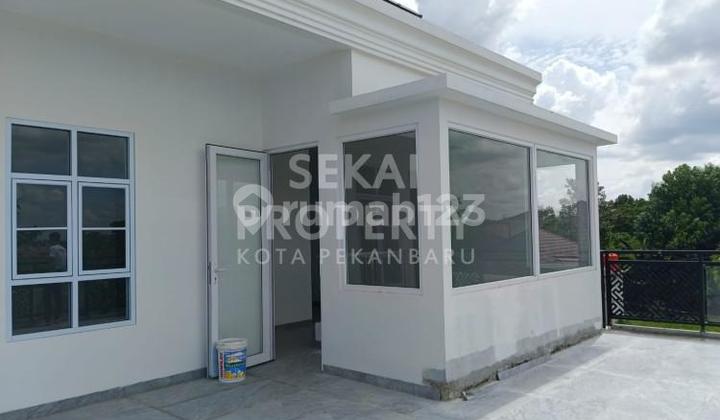 Dijual Rumah Bulatan cluster mewah dengan kolam renang pribadi lokasi Jl. Parit Indah - Pekanbaru 2