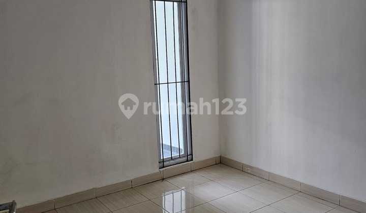 Rumah Minimalis Bebas Bsnjir di Cluster Mansion Garden Serua 2