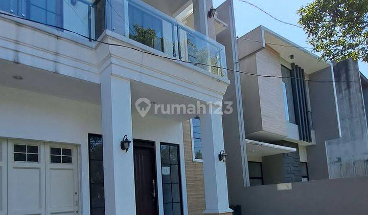 DIJUAL RUMAH MINIMALIS MODERN MAINROAD BATUNUNGGAL 1