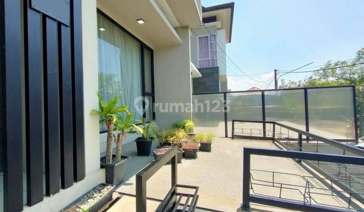 DIJUAL RUMAH 3 Lt  MINIMALIS MODERN  ....SEMI FURNISHED MEKARWANGI 1