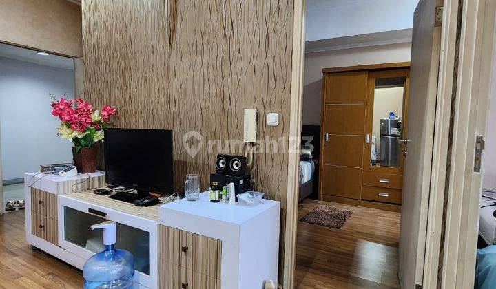 Dijual Apartemen Season City Furnished lantai Sedang 1