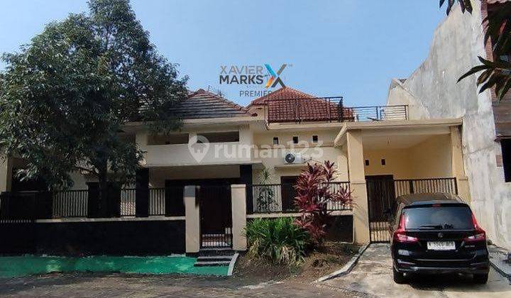 Rumah Dengan Carport Luas Di Araya Malang 1