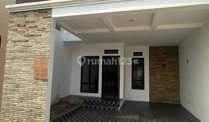 Rumah 2 Lantai Exclusive Pinggir Jalan Cikaret  1