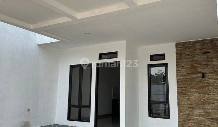 Rumah 2 Lantai Exclusive Pinggir Jalan Cikaret  2