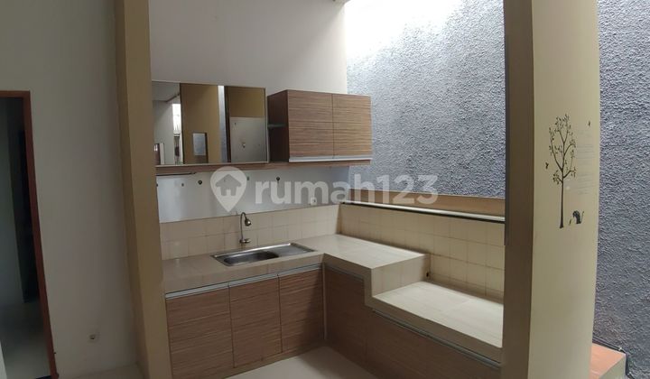 Rumah Nyaman Modern di Taman Holis Indah 2 2