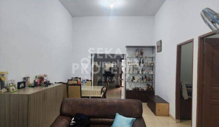 Rumah semi furnished siap huni di tengah kota Jalan Karya Indah 1