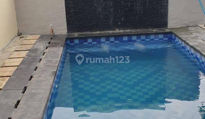 Dijual Rumah Dengan Kolam Renang Di Renon 2