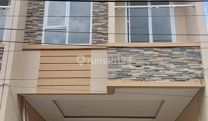 Rumah Tomang di Jalan mandala 3.25 Lantai SHM Baru jalan 2 mobil 2