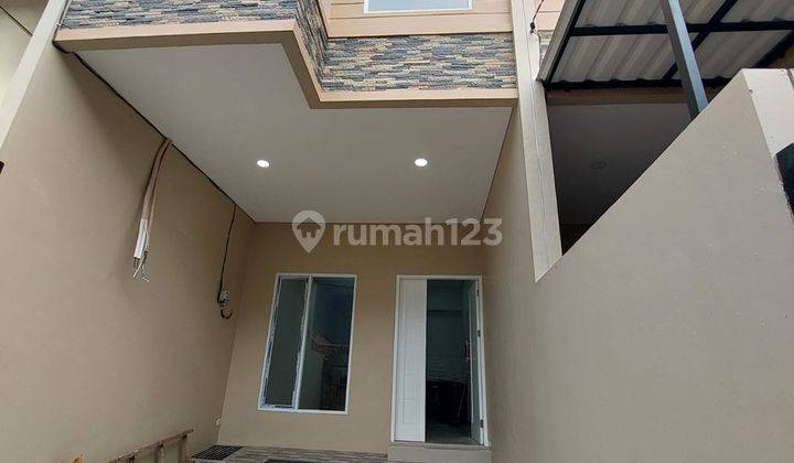 Rumah grogol 3 lantai shm jalan 2 mobil