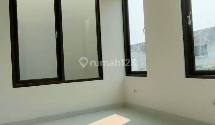 Rumah Sunrise Garden di Jalan surya mutiara 2 Lantai SHM Baru 2