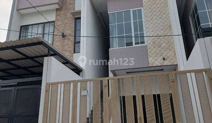 Rumah Taman Ratu 4 Lantai Timur Jalan 2 Mobil Shm 1