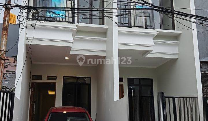 Rumah taman ratu taman cosmos 3 Lantai SHM Baru jalan 3 mobil 1