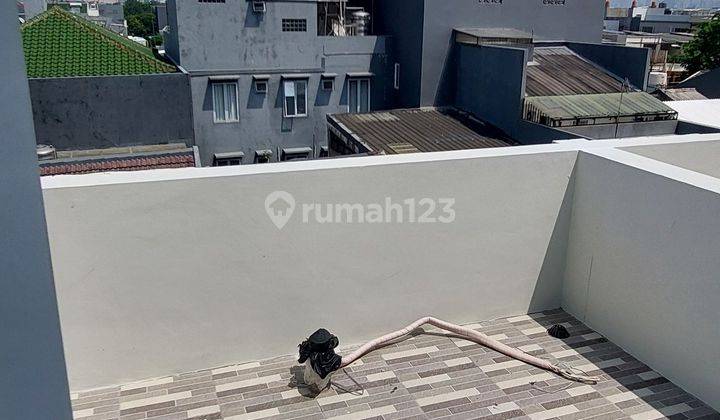 Rumah Taman Ratu 4 Lantai Jalan 2 Mobil Shm Hadap Timur 2