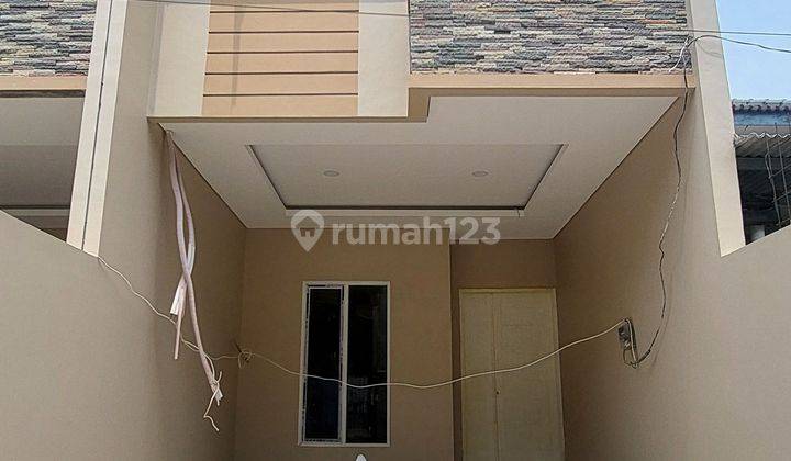 Rumah Tomang di Jalan mandala 3.25 Lantai SHM Baru jalan 2 mobil 2