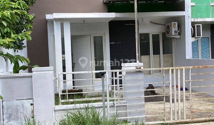 RUMAH DI LINGKUNGAN ADEM