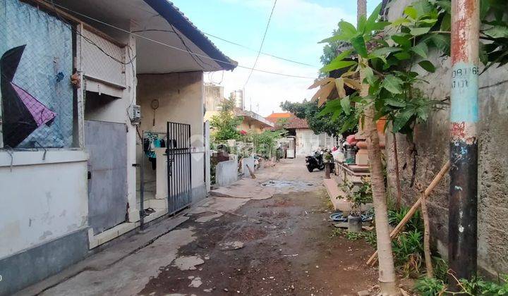 Land for sale with bonus boarding house and house on Jalan Induk Pulau Ambon 2