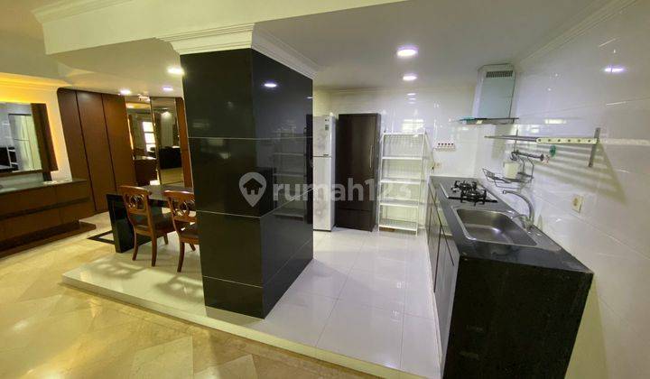 Jual Apartemen Grand Tropic Full Furnished Lantai Sedang 2