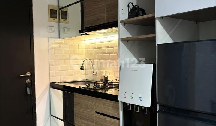 Jual Apartemen Tengah Kota 2 Kamar Tidur Furnished