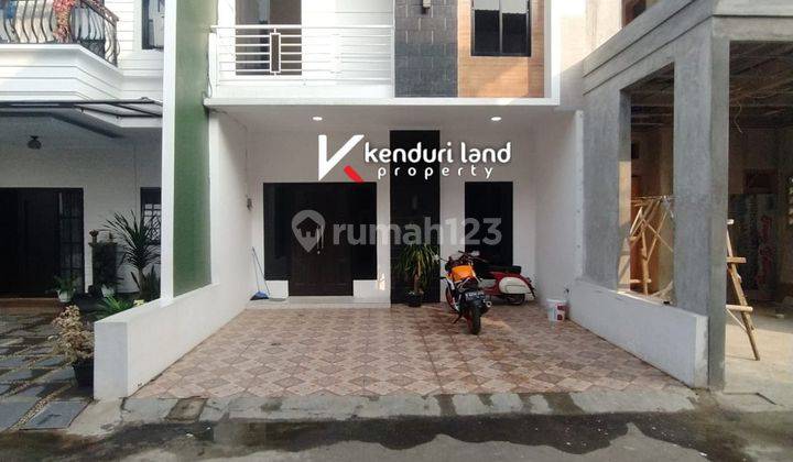 Rumah modern minimalis dalam Cluster pinggir jalan raya dekat Sarana dan Prasarana Umum    1