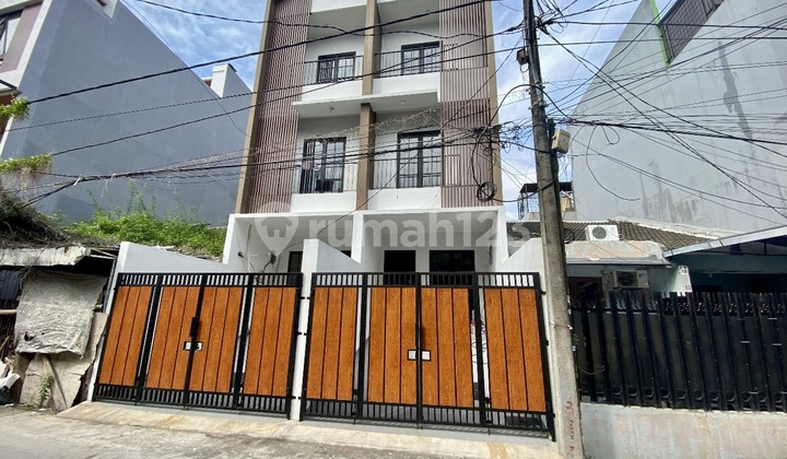 FRANS CEN-JUAL rumah di Taman ratu.baru.minimalis Jalan depan 2 mobil .Luas tanah / LB :  3,5 x17 (59m2) /3 lt 1