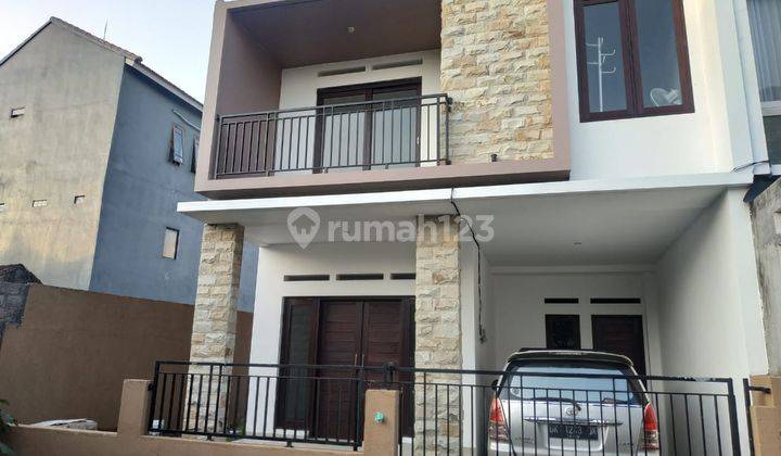 Dijual Rumah Modern Minimalis Dua Lantai Renon 1